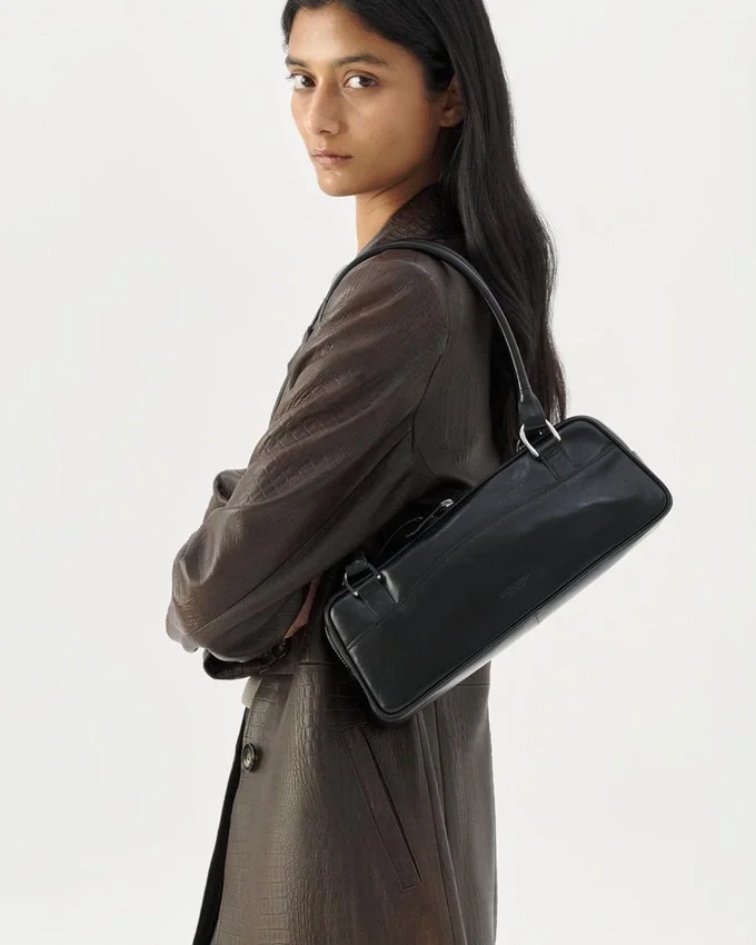 Nomi Mini-tas